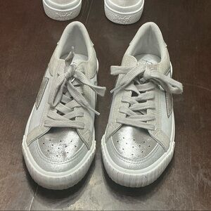 Women's Silver Sneakers Blowfish that are in like new condition.